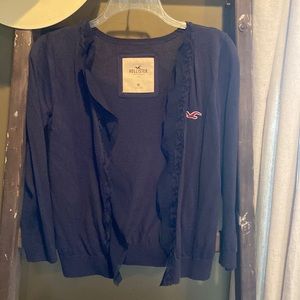 Dark blue Hollister cardigan with cute ruffle detailing. Size Medium